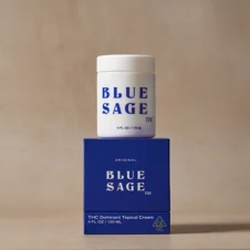 Blue Sage Original THC Dominant Topical Cream (4 FL OZ / 120 ML) white jar sitting atop its royal blue product box against a beige background.